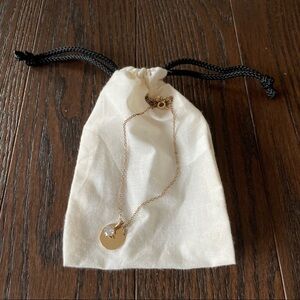 Disc and rhinestone necklace